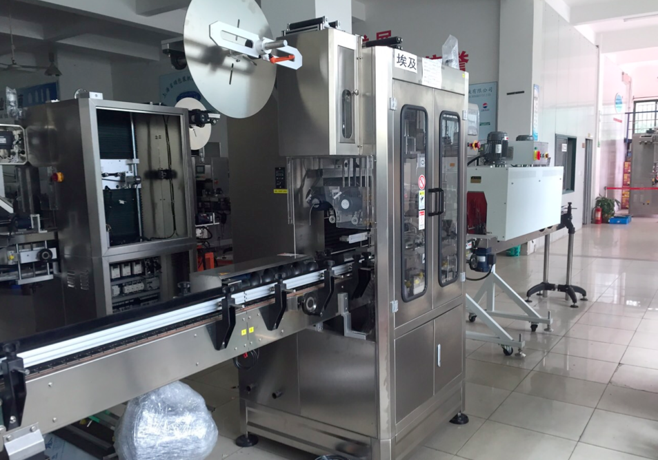 自动双头套标机维修-方瓶圆瓶自动套标机配件