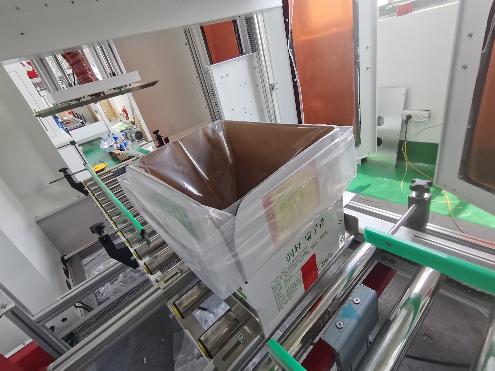 大米套袋机-全自动套袋机-纸箱套袋机修理中心